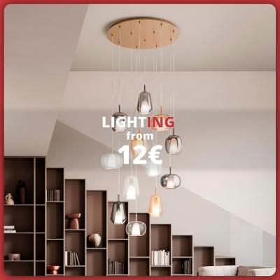 Modern pendant light with multiple colorful lamps in a contemporary interior. Text: “Lighting from €12”.