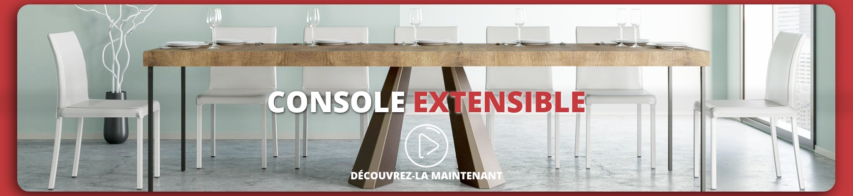 Salle à manger moderne avec table extensible et chaises blanches.