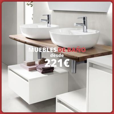 Mueble de baño moderno con doble lavabo de cerámica, encimera de madera y módulos blancos en un interior luminoso. Texto: « Muebles de baño desde 221 € ».