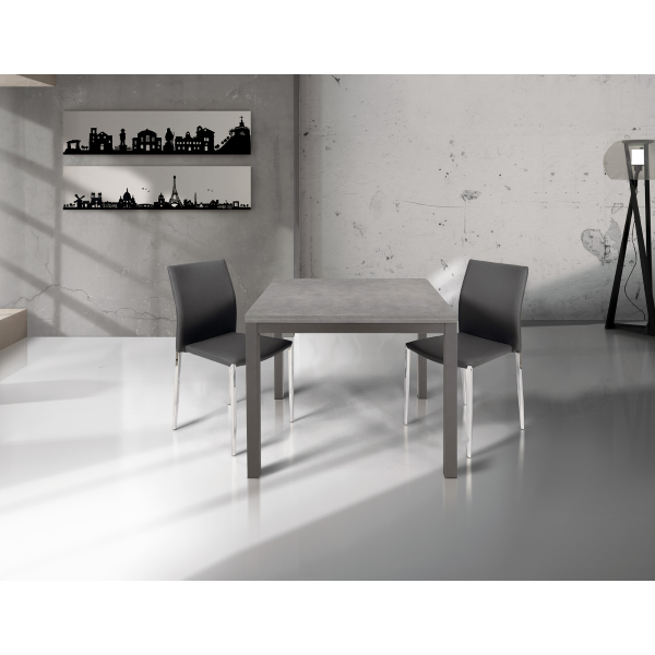 Table carrée 90x90 extensible à 180 cm qui peut être ouverte comme un livre en finition béton