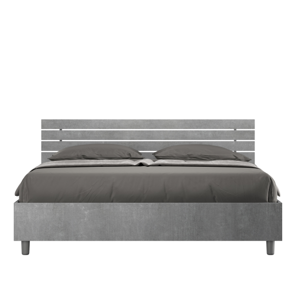 Ankel bed with inclined cement slatted headboard